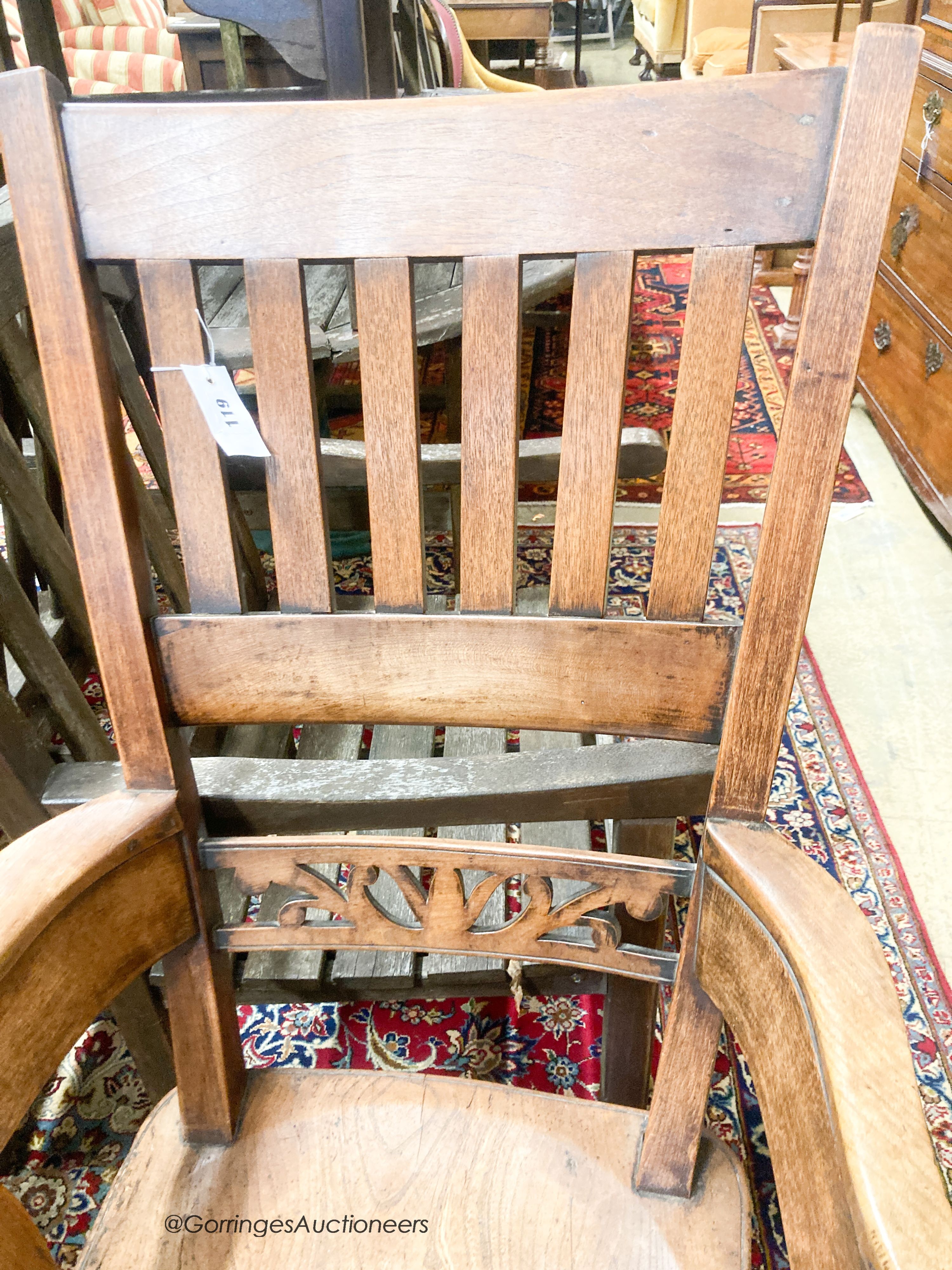 An early Victorian elm and beech Windsor armchair, width 54cm, depth 44cm, height 112cm